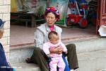 Tibetan woman with a baby