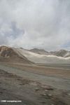 Sand dune in a mountainous pass on the Pamir Plateau