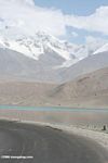 Karakoram Highway looping near a lake in Xinjiang near Lake Karakul