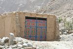 Colorful door on a Tajik structure