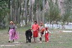 Tajik women bringing a cow in from the field