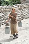 Kusrap woman fetching water