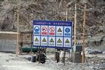 Many warning signs at a construction site in China