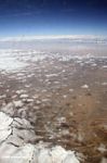 Airplane view of snow-capped mountains in Xinjiang