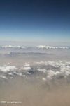Aerial view of desert and snow-capped peaks in western China