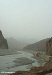 Karakoram Highway following a shallow river