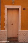 Orange door in Cartagena