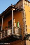 Religious statues on a balcony in Old Cartagena