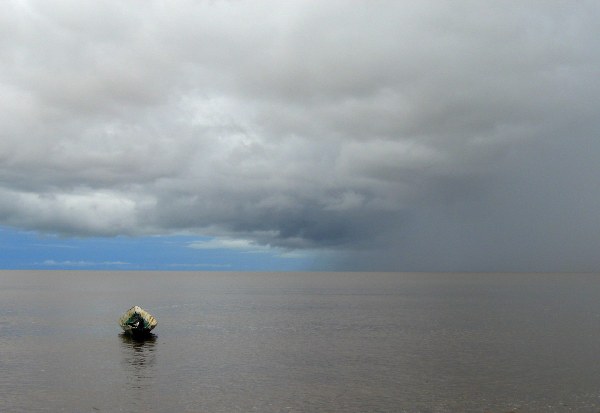 Rain coming in over beach in Suriname. Photo by: Jeremy Hance.
