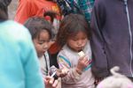 Hmong girls eating bananas