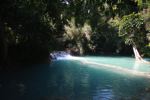 Turquoise pool at Tad Kwang Si