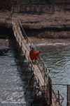 Monks on a bridge