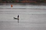 Mekong fisherman using a throw net