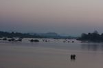 Fisherman at sunrise on the Mekong