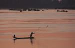 Men fishing on the Mekong at daybreak