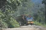 Logging truck carrying timber out of the Malaysian rainforest -- borneo_2948