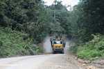 Logging truck carrying timber out of the Malaysian rainforest -- borneo_2976
