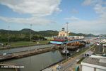 Container ship passing through the Miraflores lock of the Panama canal