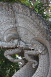 Stone dragons at Wat Phra That Pu Khao