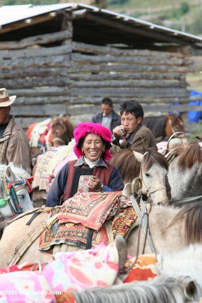 Tibetan woman at horse fair. Photo by Rhett A. Butler.